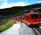 Śvýcarské vlaky - slavná červeno-žlutá "Swiss Alpes"